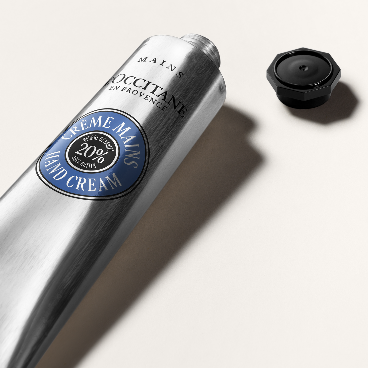 L'Occitane Shea Butter Hand Cream tube with its cap off